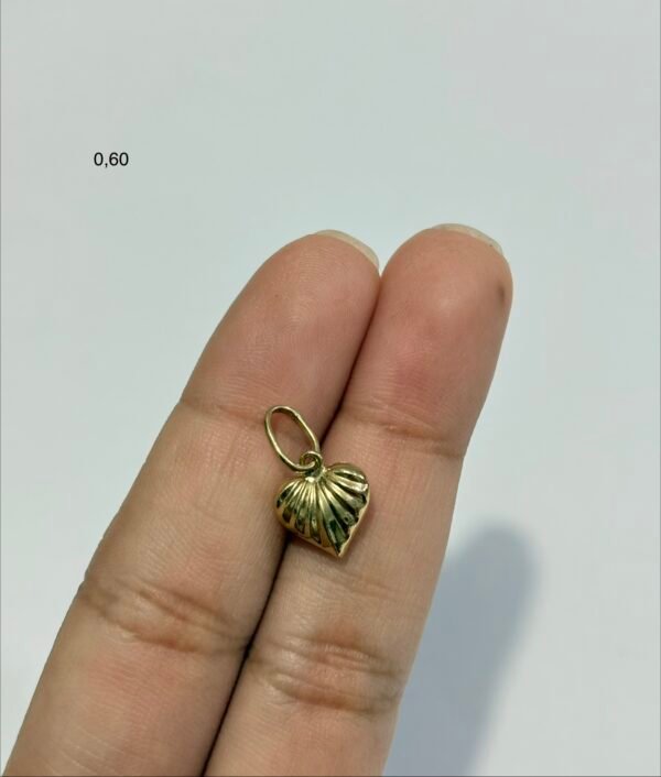 Dije Corazón  0.60gr